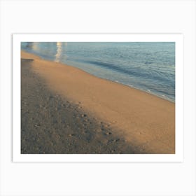 Sea water and traces on the sandy beach Art Print