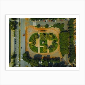 City park surrounded by roads and tram tracks photo from a drone Art Print