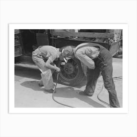 Migrants On The Road Checking Tires At Filling Station Near Henrietta I E Henryetta Oklahoma By Russell Lee Art Print