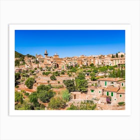 Idyllic view of Valldemossa, mediterranean Mallorca village at Spain. Village landscape of Valldemossa on Majorca, Spain Balearic Islands. A serene village landscape of Valldemossa, nestled in the scenic Balearic Islands of Spain. Art Print