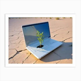 Laptop In A Dry Cracked Desert With A Green Plant Growing Out Of Its Keyboard Art Print