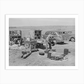 Camp Cook At Work With Chuck Wagon In Center And Truck For Carrying Bed Rolls At Left, Cattle Ranch Near Marfa, Texas By Art Print