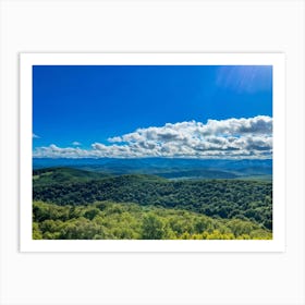 Cumulus Clouds Strewn Across A Blue Sky Above A Sweeping Scenic Landscape Vibrant Greenery Rollin Art Print