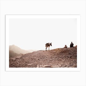 Jordan, Bedouin with it's donkey on a hill in Petra Art Print