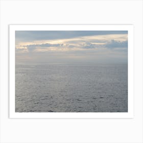 Silver-grey sea and cloudy sky at sunrise Art Print