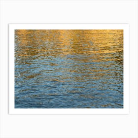 Golden reflections in blue sea water Poster