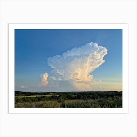 Cumulus Clouds Looming High Over A Serene Landscape Bathed In Sunset Light A Cluster Of White Clou Art Print