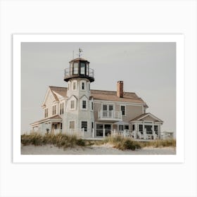 Lighthouse On The Beach Art Print