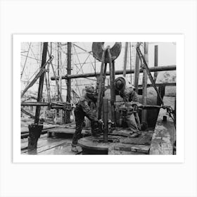 Pulling Clamp Of Elevator In Place To Being Up Section Of Drill Pipe, Oil Well, Kilgore, Texas By Russell Lee Art Print