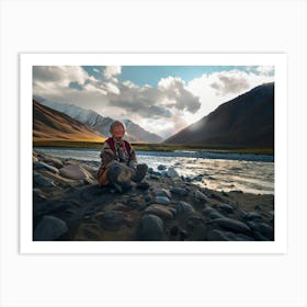 Shantiva zaga, an old tibethan woman meditating near the mountains and river Art Print