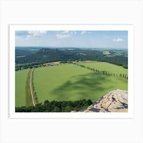 View of a green field from the summit of the Lilienstein Art Print