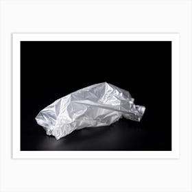 Crumpled Plastic Wrapper Casting Faint Shadows On A Clean Pitch Black Background Macro Perspective (1) 2 Art Print