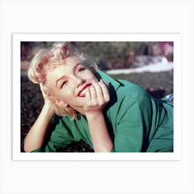 Actress Marilyn Monroe Poses For A Portrait Laying On The Grass In 1954 In Palm Springs Art Print