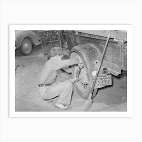 Tightening The Rear Wheel On Truck Which Will Carry Migrant Family To California From Muskogee, Oklahoma By Russell Art Print