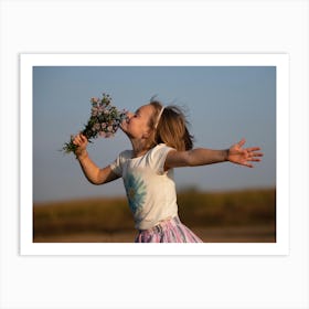 Little Girl Smelling Flowers Art Print