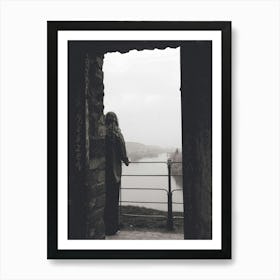 Woman Looking Out A Window in Prague Art Print