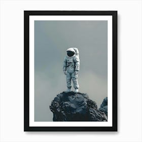 Astronaut Standing On Top Of A Rock Art Print
