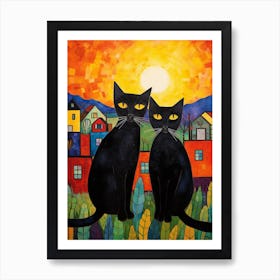 Two Black Cats At Sunrise In Front Of A Town Poster