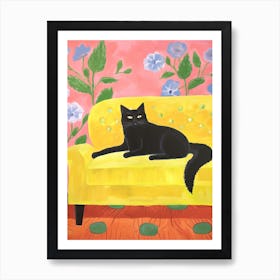 Black Cat Sitting In A Yellow Armchair Art Print