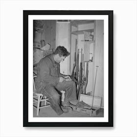 George Hutton Jr, Looking Over His Guns, Pie Town, New Mexico By Russell Lee Art Print