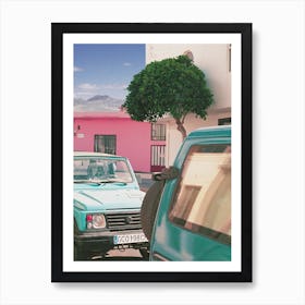 Turquoise Cars And A Pink House Art Print