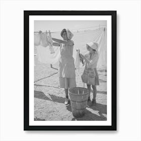 Wife Of Migratory Agricultural Laborer And Daughter Hanging Up The Wash At The Agua Fria Migratory Labor Camp Art Print
