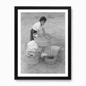Daughter Of Spanish American Farmer Washing, Chamisal, New Mexico By Russell Lee Art Print