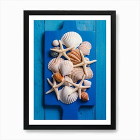 Sea Shells On A Blue Cutting Board Art Print