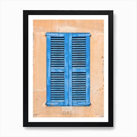 Blue Shutters On A old Wall Art Print