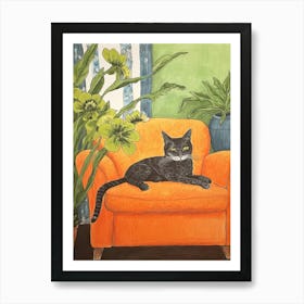 Black Cat Sitting On Orange Sofa Art Print