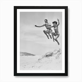 Couple Jumping In The Sand, Vintage Black and White Old Photo Art Print