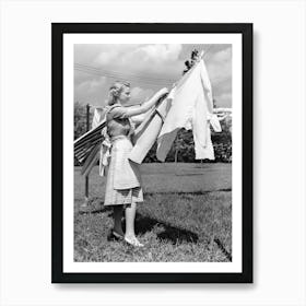 Lady Hanging Laundry on Clothesline, Vintage Black and White Old Photo Art Print