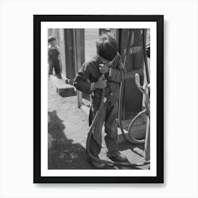 Mexican Migrant Boy Drinking Out Of Water Hose At Filling Station Where The Truck Which Is Taking Him Home From Art Print