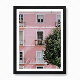 A perfect pink building with flowers on a balcony in Lisbon Art Print