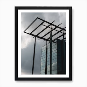 Office Building Against A Cloudy Sky Art Print