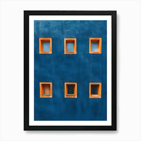 Blue Wall With Orange Windows Art Print