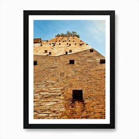 Lucca Guinigi Tower and Its Rooftop Trees. The Guinigi Tower, a historic landmark in Lucca, Italy, stands out for its unique rooftop garden featuring tall oak trees. Built in the 14th century, the red-brick structure embodies medieval architecture and offers panoramic views of the city for visitors who climb to the top. 3 Art Print