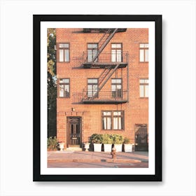 New York, USA I Red brick architecture in Brooklyn with an orange autumn aesthetic in a minimalist retro vintage photography style in arty Williamsburg overlooking the Hudson River with the light of the sunset Art Print