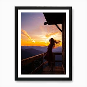 Woman Basking In Sunsets Glow On A Mountain Porch Silhouette Against A Sky Painted With Hues Of Or (4) Art Print