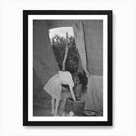 Child Of White Migrant Worker Building Fire In Heating Stove In Tent Home, Harlingen, Texas By Russell Lee Art Print