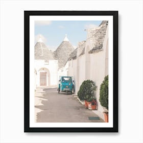 Puglia, Italy I Quiet street in Alberobello white village with trulli architecture and Vespa scooter in a retro vintage summer pastel aesthetic photography for living la dolce vita in the Mediterranean place Art Print