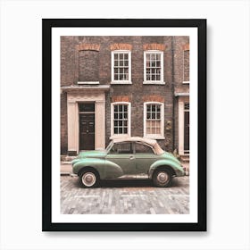 London, England I Vintage retro car on a street with urban industrial architecture and brick facade with the nostalgic aesthetic photography of a picturesque authentic British street urban city landscape Art Print