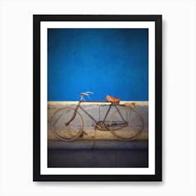 Old Bicycle Against Blue Wall Art Print