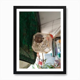 hanging swallowing bottle Art Print