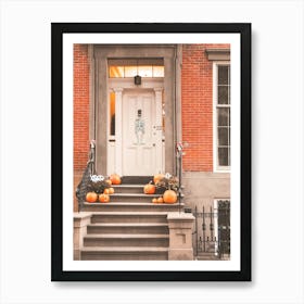 New York, USA I Halloween door in autumn tones with pumpkins and skeleton decoration for a welcoming aesthetic home to brick architecture for an original door photography for interior decor Art Print