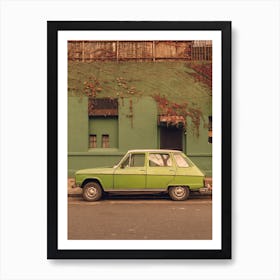 Old Green Car With Green Wall Behind Art Print