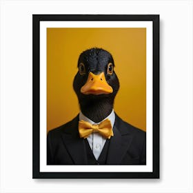 A whimsical portrait of a duck with a sleek black head and bright yellow beak, dressed in a classic black tuxedo and a cheerful yellow bow tie. Art Print