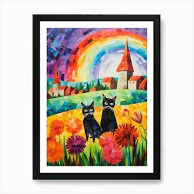 Two Black Cats With A Colourful Medieval Village In The Background Art Print