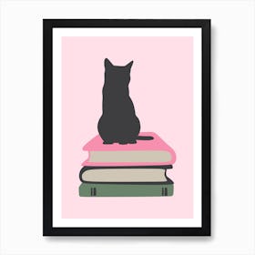 Cat sitting on books Art Print