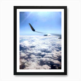 Airplane Wing Above Clouds Art Print